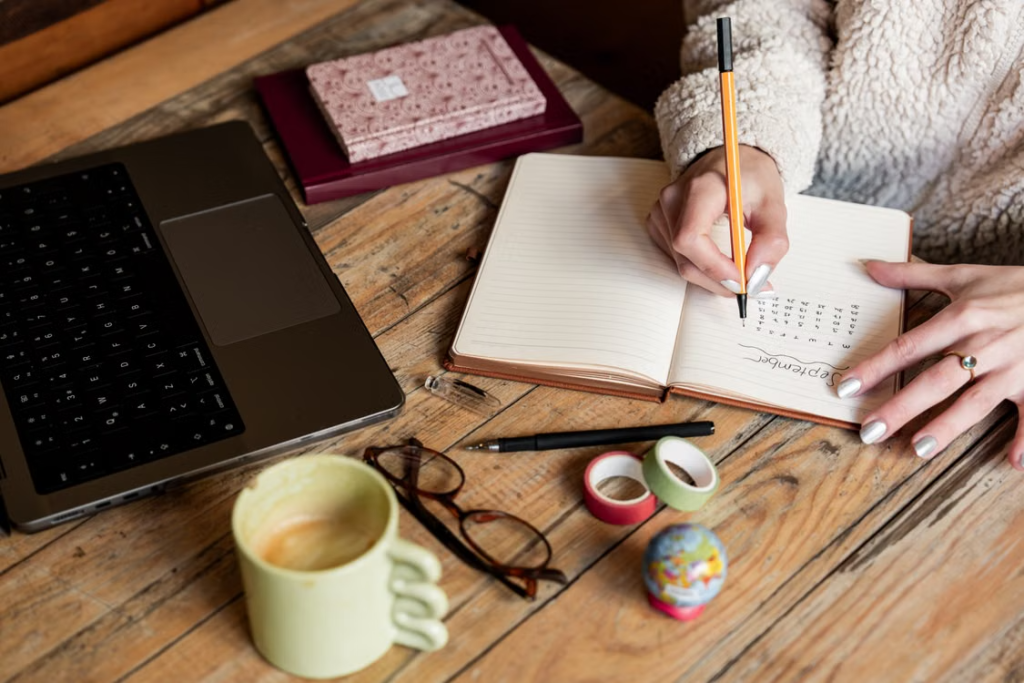 Woman journaling daily to understand perimenopause symptoms, hormone changes, and emotional wellbeing.