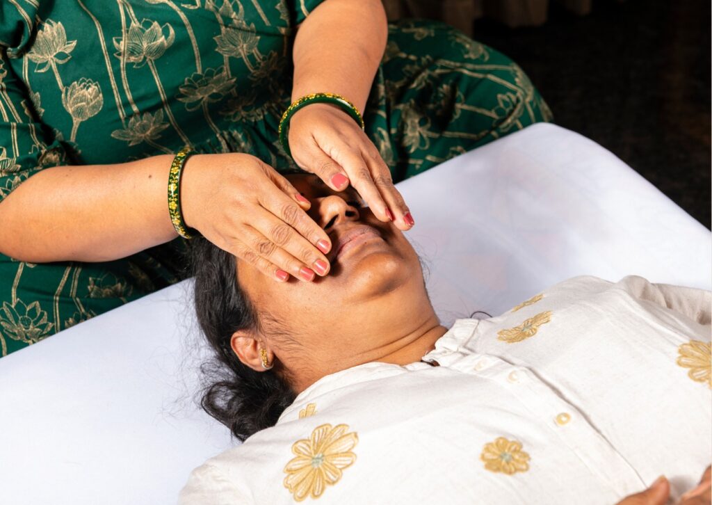 Kalashree practicing Reiki
