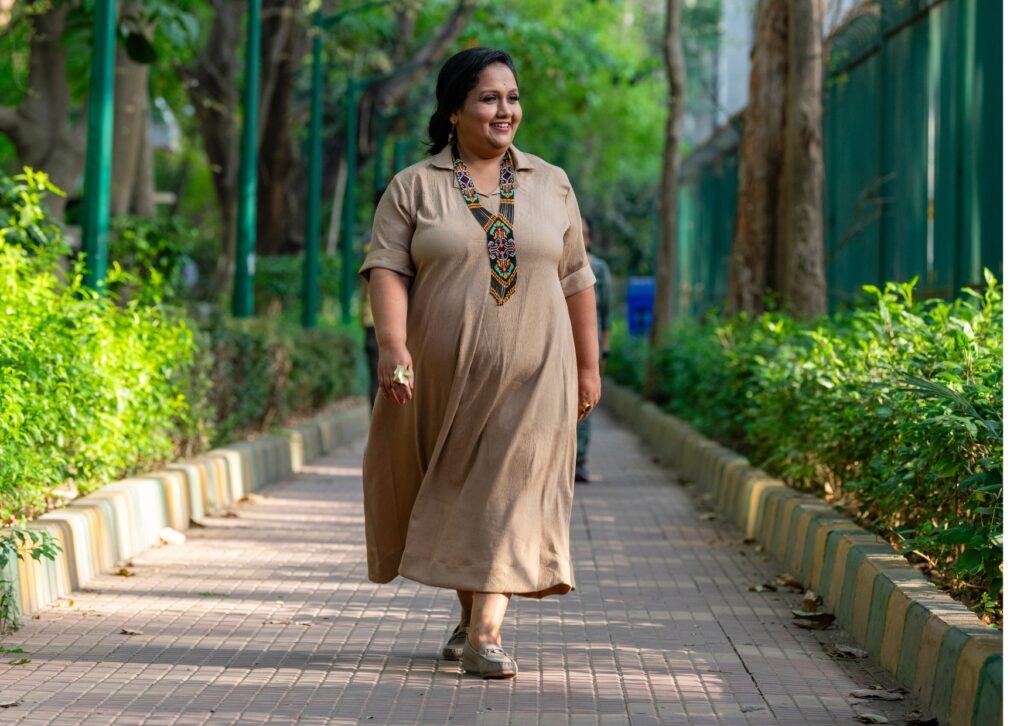 Woman over 40 supporting hormonal health through mindful movement during perimenopause 
