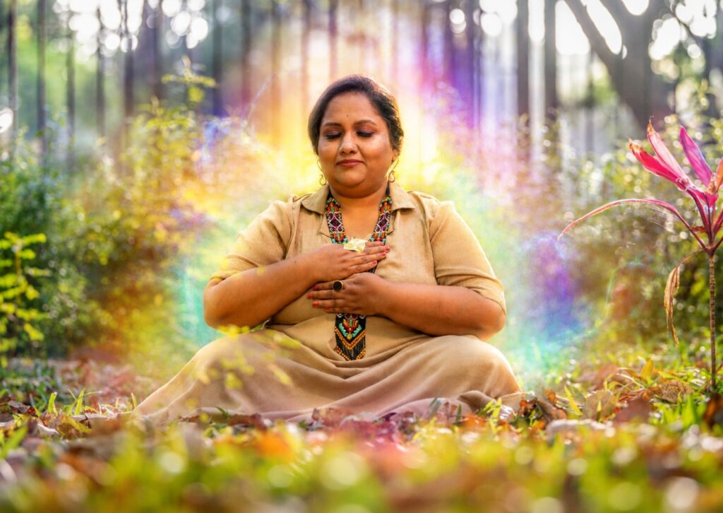 Human aura meaning showing the human energy field surrounding the body with layers of light.