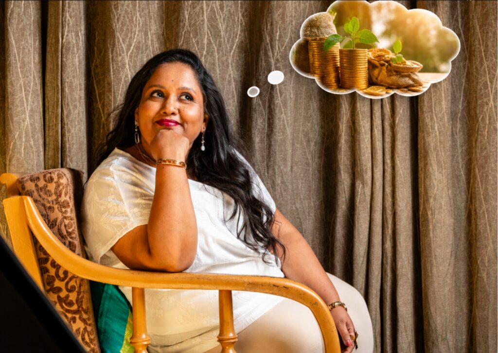 Woman thinking about money mindset and financial abundance after emotional healing.